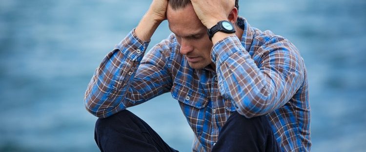 Man Thinking About Alternatives for Alcohol and Drugs While Stressed
