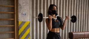 Girl working out, trying sober things to do during Covid in Boston Massachusetts