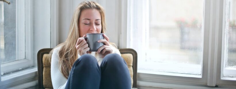 Woman relaxing with a cup of coffee